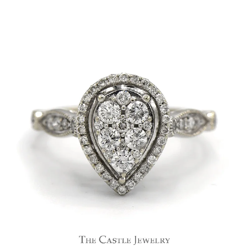 .85cttw Pear Shaped Diamond Cluster Engagement Ring with Diamond Halo and Diamond Accented Sides in 14k White Gold