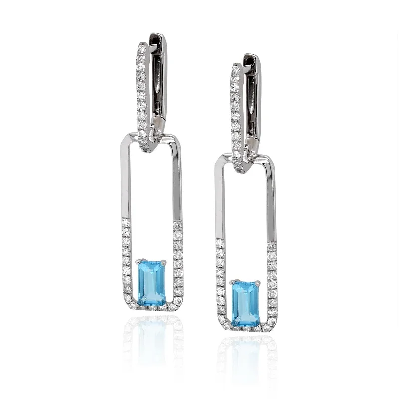 MODERN WHITE GOLD DANGLE EARRINGS WITH EMERALD CUT BLUE TOPAZ AND DIAMONDS, .37 CT TW